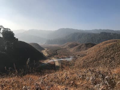 Open grassy plateau of Buning Meadow in Tamenglong
