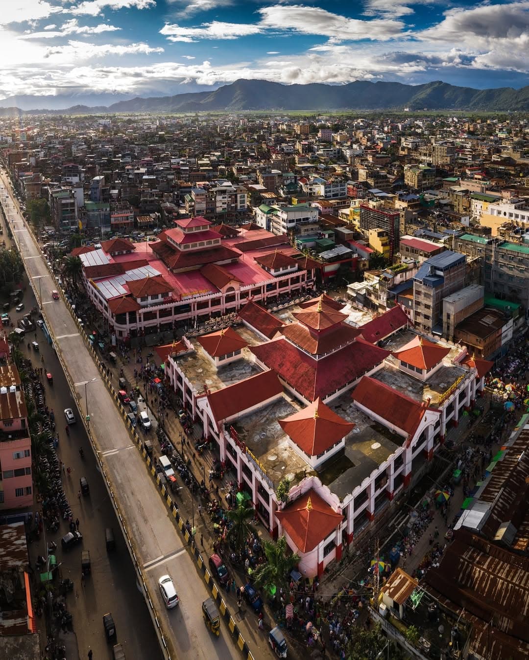 The red-roofed halls of Ima Keithel seen from above, in the middle of Imphal
