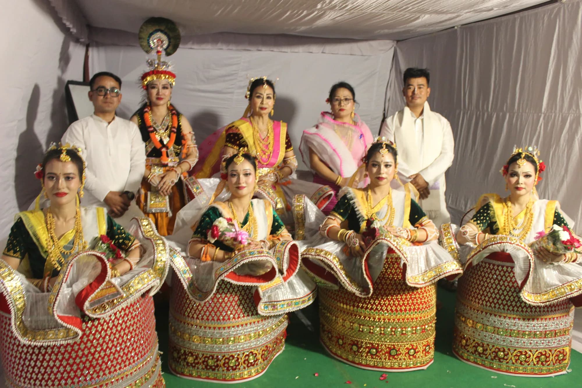 Manipuri classical dancers in traditional potloi costume